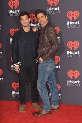September 24, 2016 - Las Vegas, Nevada, United States of America - Actors Taylor Lautner anf John Stamos attend the iHeartRadio Music Festival on September 24, 2016 at the T-Mobile Arena in Las Vegas, Nevada. Las Vegas United States of America - ZUMAt114