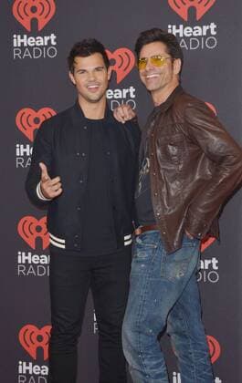 September 24, 2016 - Las Vegas, Nevada, United States of America - Actors Taylor Lautner anf John Stamos attend the iHeartRadio Music Festival on September 24, 2016 at the T-Mobile Arena in Las Vegas, Nevada. Las Vegas United States of America - ZUMAt114