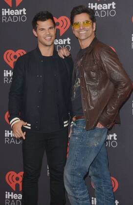 September 24, 2016 - Las Vegas, Nevada, United States of America - Actors Taylor Lautner anf John Stamos attend the iHeartRadio Music Festival on September 24, 2016 at the T-Mobile Arena in Las Vegas, Nevada. Las Vegas United States of America - ZUMAt114