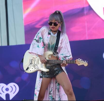 Las Vegas, Nevada, United States of America - JinJoo Lee, guitarist of pop rock group DNCE performs during the iHeartRadio Music Festival Daytime Village on September 24, 2016 at the Las Vegas Village in Las Vegas, Nevada. Las Vegas United States of America - ZUMAt114