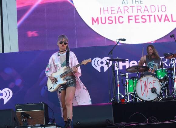 Las Vegas, Nevada, United States of America - JinJoo Lee, guitarist of pop rock group DNCE performs during the iHeartRadio Music Festival Daytime Village on September 24, 2016 at the Las Vegas Village in Las Vegas, Nevada. Las Vegas United States of America - ZUMAt114