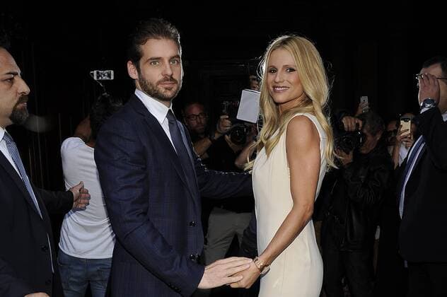 Milan fashion show Trussardi Michelle Hunziker and Tomaso Trussardi arrive on a vintage porsche  Copyright: xLivioxValeriox