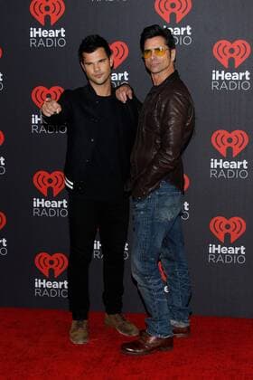 Taylor Lautner and John Stamos arrive for the iHeartRadio Music Festival at the T-Mobile Arena in Las Vegas, Nevada on September 24, 2016.  LVP20160924144 JAMESxATOA