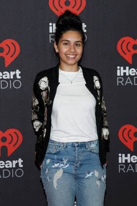 Alessia Cara arrives for the iHeartRadio Music Festival at the T-Mobile Arena in Las Vegas, Nevada on September 24, 2016.  LVP20160924154 JAMESxATOA