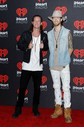 Tyler Hubbard and Brian Kelley of Florida Georgia Line arrive for the iHeartRadio Music Festival at the T-Mobile Arena in Las Vegas, Nevada on September 24, 2016.  LVP2016092496 JAMESxATOA