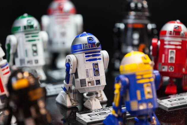 Industrial Automation R-Series Astromech Droids action figures on display at the 56th All Japan Model & Hobby Show in Tokyo Big Sight on September 25, 2016. The exhibition introduced hobby goods such as plastic models, action figures, drones, and airsoft guns.  (gxta_alljpnmodelhobbyshow023)