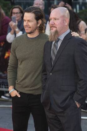 London, UK. 26 September 2016. Actor Mark Wahlberg with Mike Williams, who he plays in the movie. Red carpet arrivals for the European Premiere of the Hollywood movie Deepwater Horizon in Leicester Square. The movie is based on the 2010 Deepwater Horizon explosion and oil spill in the Gulf of Mexico. Deepwater Horizon Premiere, London, UK 