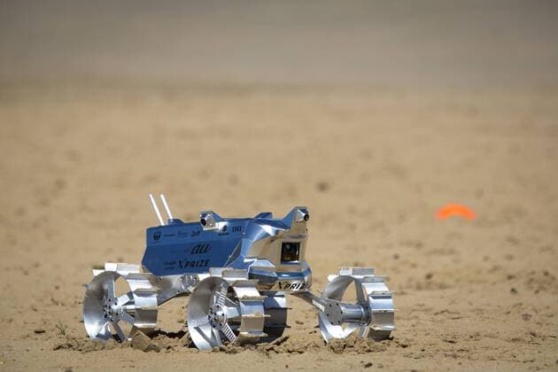 September 27, 2016 - Tottori, Tottori Prefecture, Japan - Hakuto s rover PFM3 pre-flight model is seen being tested by team ispace, Tohoku University researchers and students in Tottori Sand Dunes, Tottori Prefecture, Japan on September 27, 2016. Mounted on AstroboticÃ¢â‚¬â„¢s Ã¢â‚¬Å PeregrineÃ¢â‚¬Â lander, HAKUTOÃ¢â‚¬â„¢s rover will be launched from the Earth by SpaceXÃ¢â‚¬â„¢s Falcon 9 rocket, and sent to lunar orbit. The Peregrine lander will achieve soft landing on the moon. The rover is then deployed onto the MoonÃ¢â‚¬â„¢s surface..(Photo by Richard Atrero de Guzman NURPhoto) Tottori Japan  - ZUMAn230
