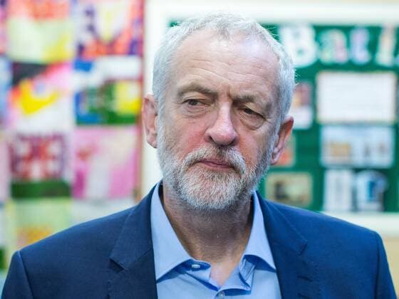 September 27, 2016 - Liverpool, Merseyside, UK - Liverpool , UK . Labour Party leader JEREMY CORBYN visits Faith Primary School in Liverpool , where he listens to and then joins in with the school orchestra Liverpool UK  - ZUMAl94_