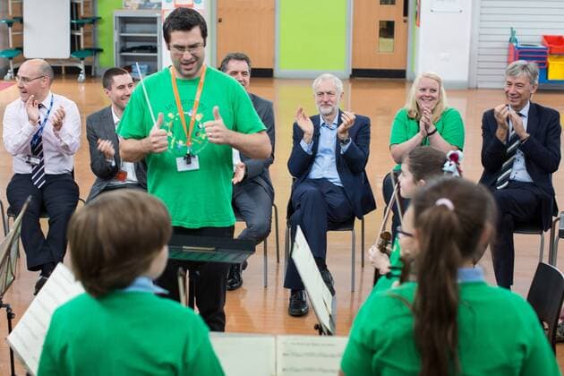 September 27, 2016 - Liverpool, Merseyside, UK - Liverpool , UK . STEVE ROTHERAM and JEREMY CORBYN visits Faith Primary School in Liverpool , where they listen to and then joins in with the school orchestra Liverpool UK  - ZUMAl94_