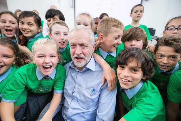 September 27, 2016 - Liverpool, Merseyside, UK - Liverpool , UK . Labour Party leader JEREMY CORBYN visits Faith Primary School in Liverpool , where he listens to and then joins in with the school orchestra Liverpool UK  - ZUMAl94_