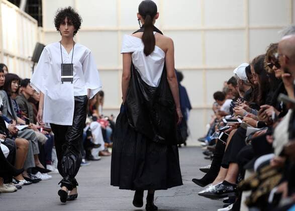 A model takes to the catwalk during the presentation of Nehera s show as part of the Spring-Summer 2017 Paris Fashion Week on September 27, 2016.  PAR20160927105 MAYAxVIDON-WHITE