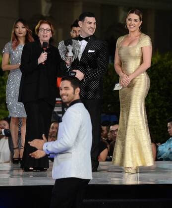 Beauty queen and actress Alicia Machado announces winners with Eduardo Khawam during the Metropolitan Fashion Week Closing Gala & Awards Show at Warner Bros Studios in Burbank, California on October 1, 2016. The former Miss Universe, whom Democratic presidential candidate Hillary Clinton mentioned during the first presidential debate, has been the subject of series of derisive tweets from Clinton s Republican opponent Donald Trump.  LAP2016100119 JIMxRUYMEN