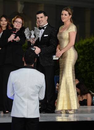 Beauty queen and actress Alicia Machado announces winners with Eduardo Khawam during the Metropolitan Fashion Week Closing Gala & Awards Show at Warner Bros Studios in Burbank, California on October 1, 2016. The former Miss Universe, whom Democratic presidential candidate Hillary Clinton mentioned during the first presidential debate, has been the subject of series of derisive tweets from Clinton s Republican opponent Donald Trump.  LAP2016100118 JIMxRUYMEN