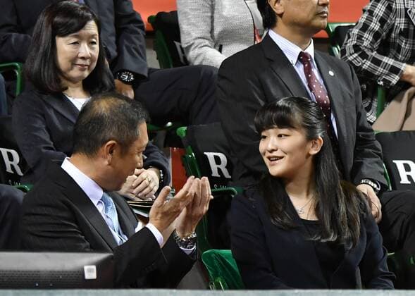 October 3, 2016, Tokyo, Japan - Japanese Princess Mako, right, speaks to an unidentified official as she watches a tennis match during the Japan Open Tennis Championships at Tokyos Ariake Colosseum on Monday, October 3, 2016. The princess, a grand daughter of Emperor Akihito, is the honorary president of the Japan Tennis Association.  (ayfa017770)