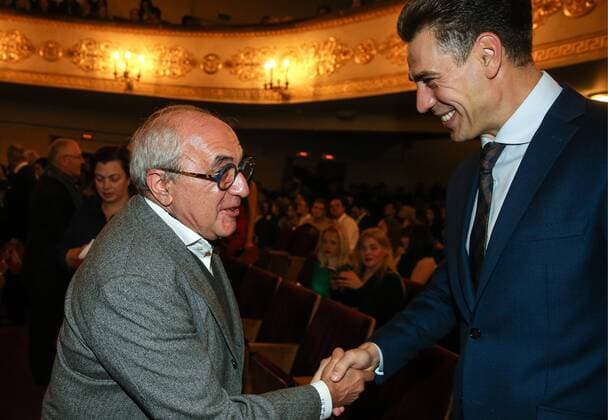 MOSCOW, RUSSIA - OCTOBER 8, 2016: Lawyer Alexander Dobrovinsky (L) and actor Dmitry Dyuzhev shake hands at the premiere of the Anna Karenina musical at Moscow Operetta Theatre. Valery Sharifulin TASS  TS033BDD