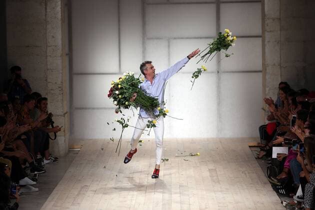 October 9, 2016 - Lisbon, Portugal - Portuguese fashion designer Filipe Faisca acknowledges cheers and send flowers after presenting the Spring Summer 2017 collection during the Lisbon Fashion Week on October 9, 2016 in Lisbon, Portugal. Lisbon Portugal  - ZUMAn230