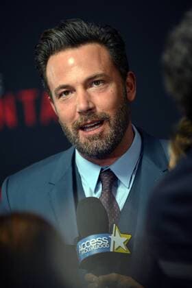 Ben Affleck speaks with television reporters in the press line as he arrives at the Los Angeles World Premiere of The Accountant at the TCL Chinese Theater in Los Angeles, California on October 10, 2016.  LAP20161010727 CHRISTINExCHEW