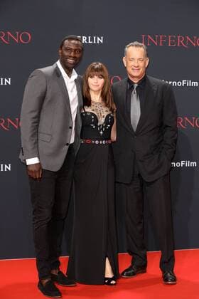 Omar Sy, Felicity Jones und Tom Hanks, die Hauptdarsteller bei der Inferno Film Premiere am 10.10.2016 in Berlin Inferno Kino Premiere in Berlin, 2016 