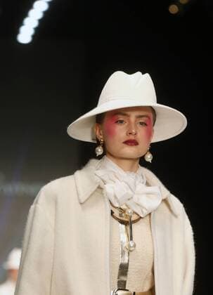 MOSCOW, RUSSIA â€“ OCTOBER 13, 2016: A model showcases a creation during a runway show for the Spring Summer 2017 collection by designer Slava Zaitsev at the Mercedes-Benz Fashion Week Russia in the Manege Central Exhibition Hall. Vyacheslav Prokofyev TASS  TS0346B0