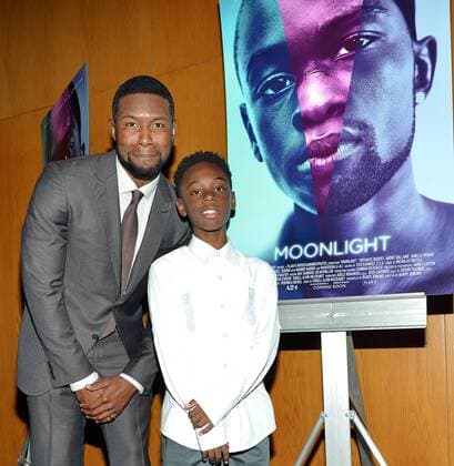 Trevante Rhodes (L) and Alex Hibbert arrive at the Los Angeles premiere of Moonlight at the DGA Theater in Los Angeles, California on October 13, 2016.  LAP20161013714 CHRISTINExCHEW