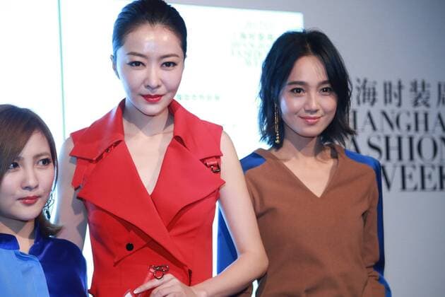 SHANGHAI, CHINA - OCTOBER 13: (L-R) Designer C.J Yao, model and actress Lynn Hung (aka Xiong Dailin) and hostess and actress Zhu Dan attend the C.J.YAO presentation as part of the Shanghai Fashion Week Spring Summer 2017 at Xintiandi Hall A on October 13, 2016 in Shanghai, China.  CFP493763037
