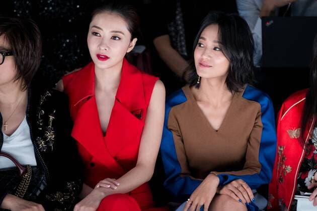 SHANGHAI, CHINA - OCTOBER 13: Model and actress Lynn Hung (aka Xiong Dailin) and hostess and actress Zhu Dan (R) attend the C.J.YAO presentation as part of the Shanghai Fashion Week Spring Summer 2017 at Xintiandi Hall A on October 13, 2016 in Shanghai, China.  CFP493763045