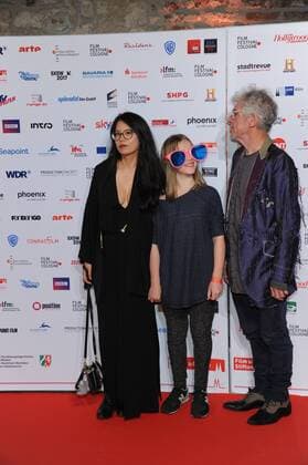 Der Regisseur Christopher Doyle (l) und Rain Kathy Li (r) posiert am 14.10.2016 in Köln auf dem roten Teppich beim International Film Award NRW im Rahmen des Film Festival Cologne. (vormals: Cologne Conference) ein internationales Film- und Fernsehfestival in Köln.