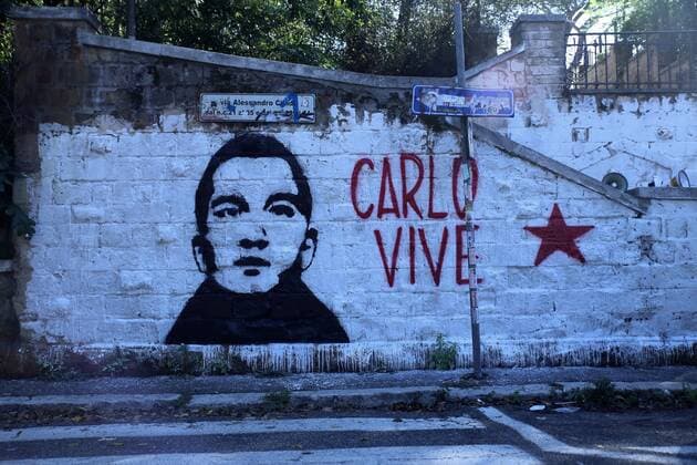 Italy: Restored Mural for Carlo Giuliani in Rome Casetta Rossa, Social Centre La Strada and the local community of Garbatella have restored the mural dedicated to Carlo Giuliani, who was killed in Genoa during the G8 summit in 2001.  MatteoxNardone