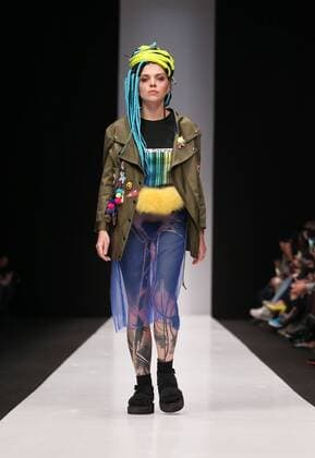 MOSCOW, RUSSIA - OCTOBER 16, 2016: A model showcases creations during a runway show for the Spring Summer 2017 collections by the designers of the CONTRFASHION project at the Mercedes-Benz Fashion Week Russia in the Manege Central Exhibition Hall. Vyacheslav Prokofyev TASS  TS034AA0