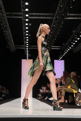 MOSCOW, RUSSIA - OCTOBER 16, 2016: A model showcases creations during a runway show for the Spring Summer 2017 collections by the designers of the CONTRFASHION project at the Mercedes-Benz Fashion Week Russia in the Manege Central Exhibition Hall. Vyacheslav Prokofyev TASS  TS034AAE