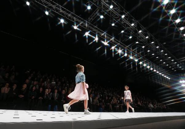 MOSCOW, RUSSIA - OCTOBER 16, 2016: Models showcase creations during a runway show for the La Belle et la Bete collection by designers of The Walt Disney Company CIS at the Mercedes-Benz Fashion Week Russia in the Manege Central Exhibition Hall. Vyacheslav Prokofyev TASS  TS034ADF