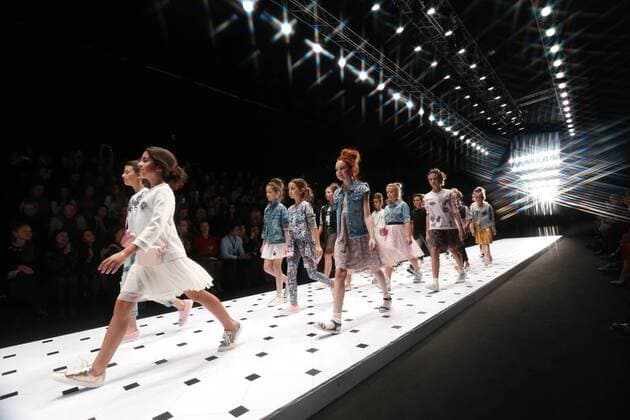 MOSCOW, RUSSIA - OCTOBER 16, 2016: Models showcase creations during a runway show for the La Belle et la Bete collection by designers of The Walt Disney Company CIS at the Mercedes-Benz Fashion Week Russia in the Manege Central Exhibition Hall. Vyacheslav Prokofyev TASS  TS034AE3
