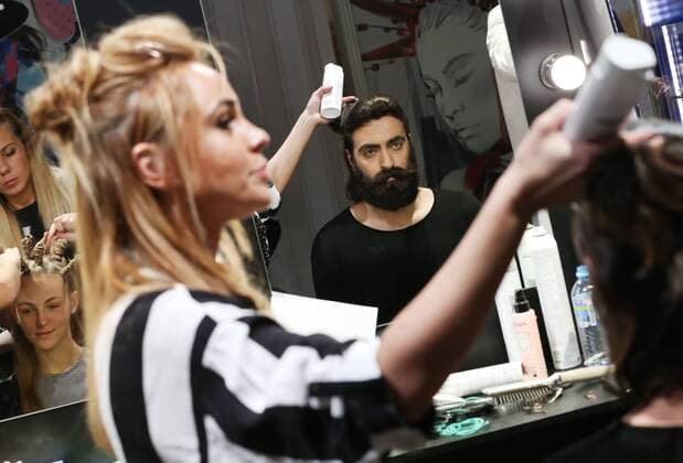 MOSCOW, RUSSIA - OCTOBER 16, 2016: Models have their hair done ahead of a runway show for the Spring Summer 2017 collection by Russian fashion designer Yegor Zaitsev at the Mercedes-Benz Fashion Week Russia in the Manege Central Exhibition Hall. Vyacheslav Prokofyev TASS  TS034B0B