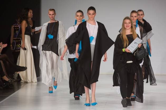 Serbian fashion designer Sonja Jocic (1st R, front) celebrates her award with models during the Gombold ujra Central Europe fashion design competition in Budapest, Hungary, on Oct. 16, 2016. Sonja Jocic won the Best International Desinger award. The competition was held by Hungary s Design Terminal. )(zcc) HUNGARY-BUDAPEST-FASHION-COMPETITION AttilaxVolgyi 