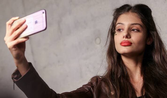 October 15, 2016 - Budapest, Hungary - Model takes a photograph of herself as get ready at the backstage before showing of the Hungarian designer Tomcsanyi s collection at Mercedes-Benz Fashion Week Central Europe on Oct 15, 2016 at VoÂ¡rkert BazoÂ¡r in Budapest, Hungary. Budapest Hungary  - ZUMAn230
