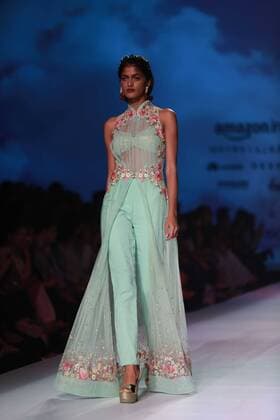 NEW DELHI, INDIA - OCTOBER 15: A model showcases the creation of designer Mandira Wirk during Amazon India Fashion Week Spring-Summer 17 at NSIC Exhibition Complex on October 15, 2016 in New Delhi, India. (Photo by Amal Ks Hindustan Times) Amazon India Fashion Week Spring Summer 2017