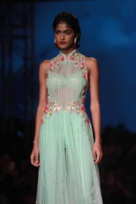 NEW DELHI, INDIA - OCTOBER 15: A model showcases the creation of designer Mandira Wirk during Amazon India Fashion Week Spring-Summer 17 at NSIC Exhibition Complex on October 15, 2016 in New Delhi, India. (Photo by Amal Ks Hindustan Times) Amazon India Fashion Week Spring Summer 2017