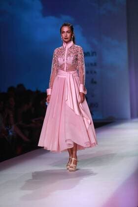 NEW DELHI, INDIA - OCTOBER 15: A model showcases the creation of designer Mandira Wirk during Amazon India Fashion Week Spring-Summer 17 at NSIC Exhibition Complex on October 15, 2016 in New Delhi, India. (Photo by Amal Ks Hindustan Times) Amazon India Fashion Week Spring Summer 2017