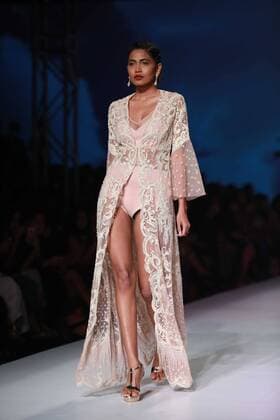 NEW DELHI, INDIA - OCTOBER 15: A model showcases the creation of designer Mandira Wirk during Amazon India Fashion Week Spring-Summer 17 at NSIC Exhibition Complex on October 15, 2016 in New Delhi, India. (Photo by Amal Ks Hindustan Times) Amazon India Fashion Week Spring Summer 2017