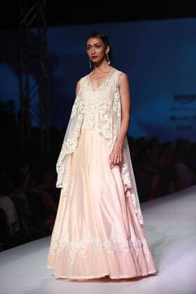 NEW DELHI, INDIA - OCTOBER 15: A model showcases the creation of designer Mandira Wirk during Amazon India Fashion Week Spring-Summer 17 at NSIC Exhibition Complex on October 15, 2016 in New Delhi, India. (Photo by Amal Ks Hindustan Times) Amazon India Fashion Week Spring Summer 2017