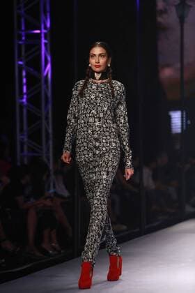 NEW DELHI, INDIA - OCTOBER 15: A model showcases the creation of designer Masaba Gupta during Amazon India Fashion Week Spring-Summer 17 at NSIC Exhibition Complex on October 15, 2016 in New Delhi, India. (Photo by Amal Ks Hindustan Times) Amazon India Fashion Week Spring Summer 2017