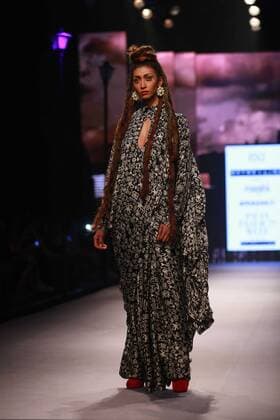 NEW DELHI, INDIA - OCTOBER 15: A model showcases the creation of designer Masaba Gupta during Amazon India Fashion Week Spring-Summer 17 at NSIC Exhibition Complex on October 15, 2016 in New Delhi, India. (Photo by Amal Ks Hindustan Times) Amazon India Fashion Week Spring Summer 2017