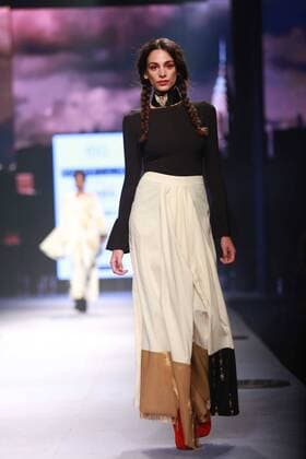 NEW DELHI, INDIA - OCTOBER 15: A model showcases the creation of designer Masaba Gupta during Amazon India Fashion Week Spring-Summer 17 at NSIC Exhibition Complex on October 15, 2016 in New Delhi, India. (Photo by Amal Ks Hindustan Times) Amazon India Fashion Week Spring Summer 2017