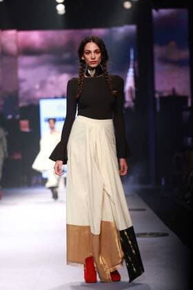 NEW DELHI, INDIA - OCTOBER 15: A model showcases the creation of designer Masaba Gupta during Amazon India Fashion Week Spring-Summer 17 at NSIC Exhibition Complex on October 15, 2016 in New Delhi, India. (Photo by Amal Ks Hindustan Times) Amazon India Fashion Week Spring Summer 2017