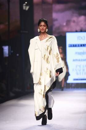 NEW DELHI, INDIA - OCTOBER 15: A model showcases the creation of designer Masaba Gupta during Amazon India Fashion Week Spring-Summer 17 at NSIC Exhibition Complex on October 15, 2016 in New Delhi, India. (Photo by Amal Ks Hindustan Times) Amazon India Fashion Week Spring Summer 2017
