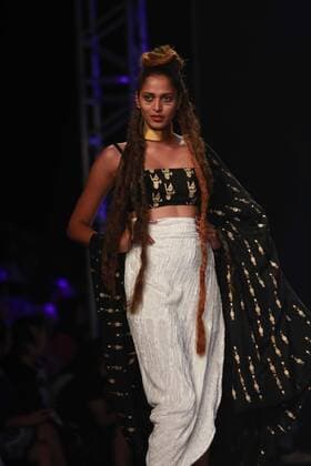 NEW DELHI, INDIA - OCTOBER 15: A model showcases the creation of designer Masaba Gupta during Amazon India Fashion Week Spring-Summer 17 at NSIC Exhibition Complex on October 15, 2016 in New Delhi, India. (Photo by Amal Ks Hindustan Times) Amazon India Fashion Week Spring Summer 2017
