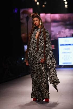 NEW DELHI, INDIA - OCTOBER 15: A model showcases the creation of designer Masaba Gupta during Amazon India Fashion Week Spring-Summer 17 at NSIC Exhibition Complex on October 15, 2016 in New Delhi, India. (Photo by Amal Ks Hindustan Times) Amazon India Fashion Week Spring Summer 2017