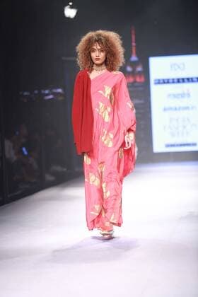 NEW DELHI, INDIA - OCTOBER 15: A model showcases the creation of designer Masaba Gupta during Amazon India Fashion Week Spring-Summer 17 at NSIC Exhibition Complex on October 15, 2016 in New Delhi, India. (Photo by Amal Ks Hindustan Times) Amazon India Fashion Week Spring Summer 2017
