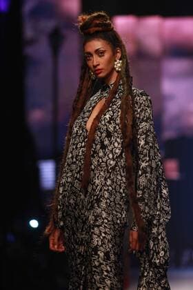 NEW DELHI, INDIA - OCTOBER 15: A model showcases the creation of designer Masaba Gupta during Amazon India Fashion Week Spring-Summer 17 at NSIC Exhibition Complex on October 15, 2016 in New Delhi, India. (Photo by Amal Ks Hindustan Times) Amazon India Fashion Week Spring Summer 2017